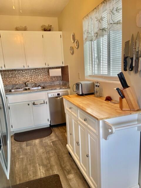 2960 Cynthia Lane, Unit 206 Lake Worth Beach, FL 33461 - Photo 14 of 38 a bathroom with a granite countertop sink a mirror and a bathtub