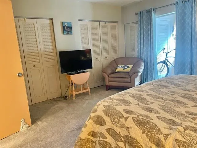 a bedroom with a bed and furniture