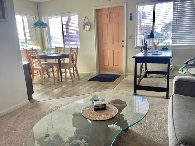 2960 Cynthia Lane, Unit 206 Lake Worth Beach, FL 33461 - Photo 6 of 38 a room with furniture and a wooden floor
