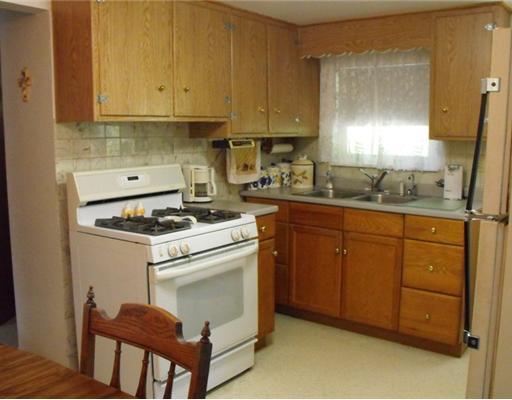 6076 Baker School Road Level Green, PA 15085 - Photo 5 of 18 Kitchen. Main house - propane gas stove & refrigerator stays.