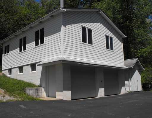 6076 Baker School Road Level Green, PA 15085 - Photo 8 of 18 Exterior Front. 2-car detached Garage with 1 bedroom efficiency apartment above level rear entry)