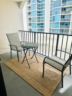 a view of a porch with furniture