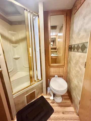 a view of a chairs and table in the patio