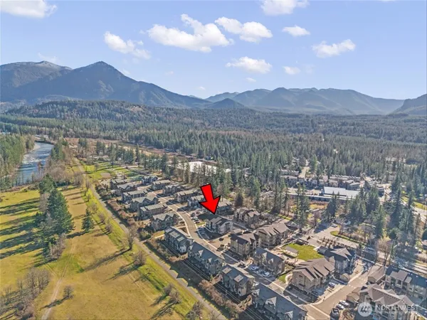 a view of a street with cars