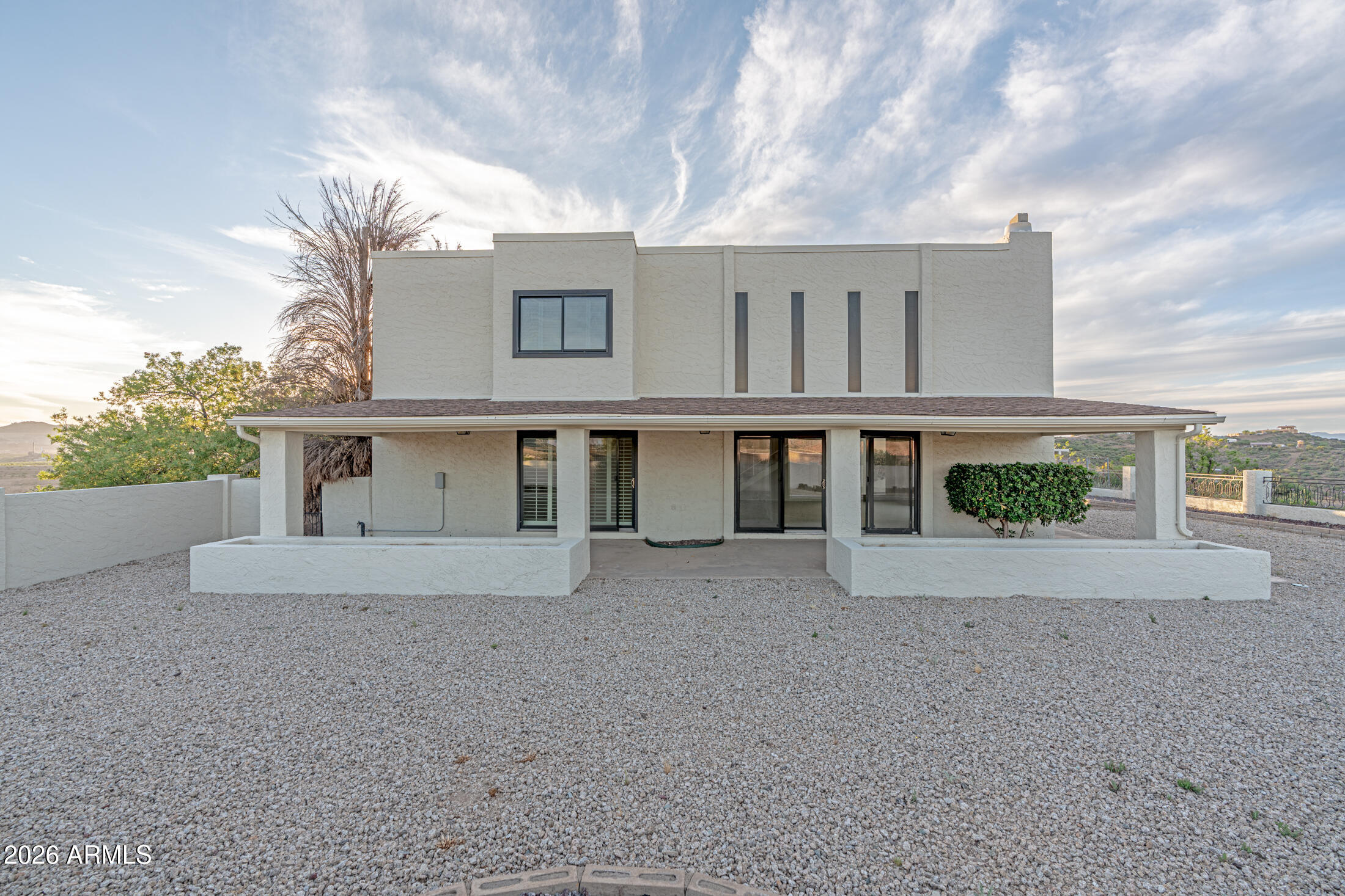 1052 West Estate Drive Miami, AZ 85539 - Photo 1 of 13 a view of a house with a yard