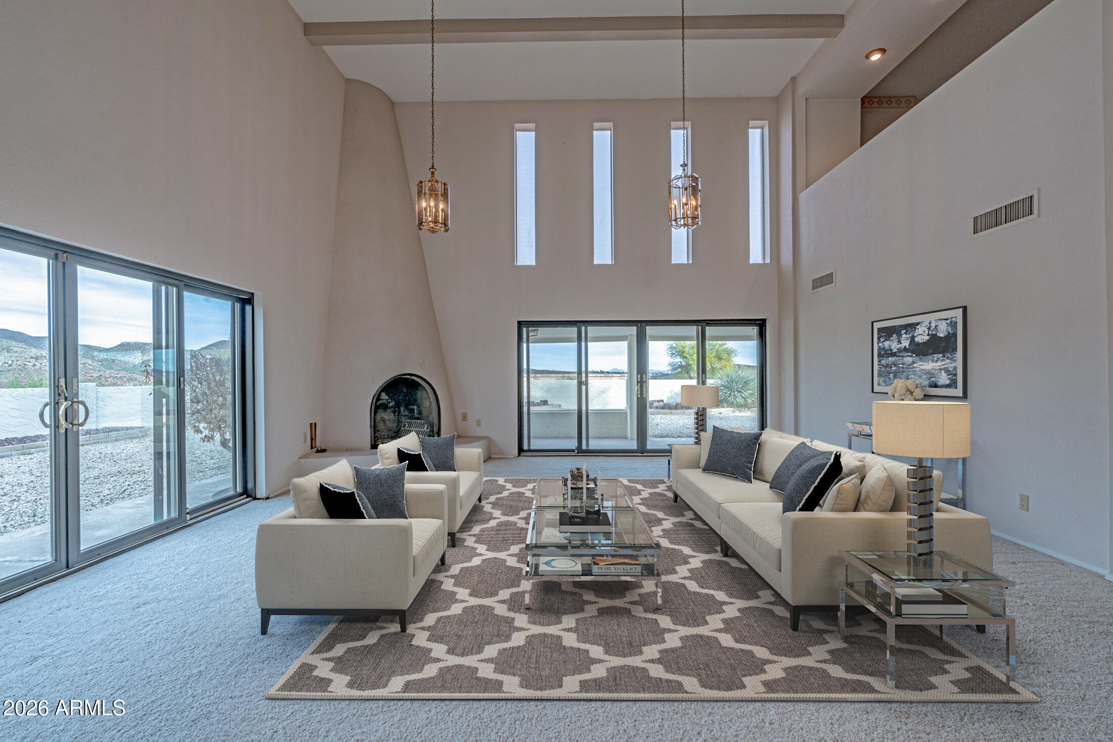 1052 West Estate Drive Miami, AZ 85539 - Photo 4 of 13 a living room with furniture ceiling fan and a rug