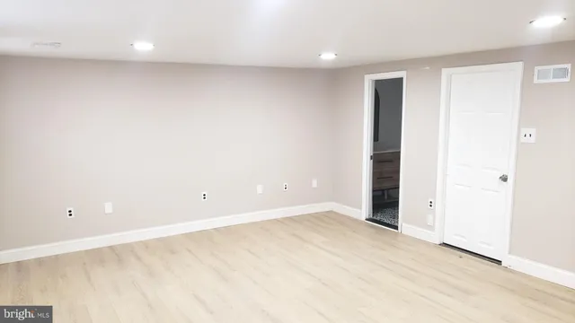 an empty room with a natural light