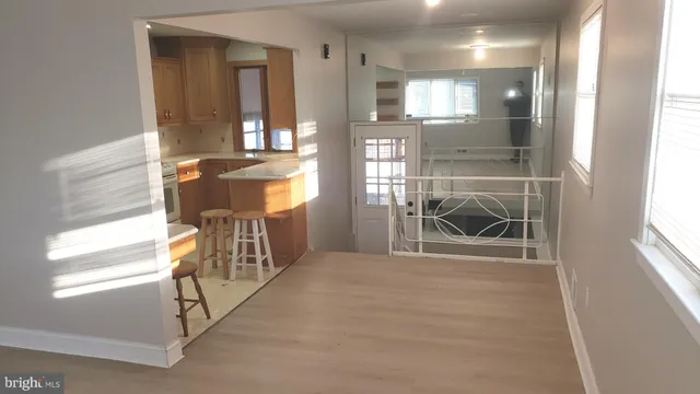 a view of livingroom with furniture and windows