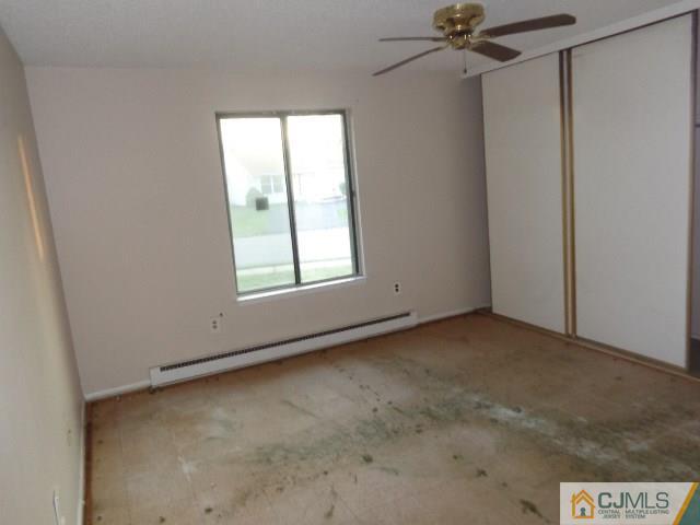 31 A Haddon Road Monroe Township, NJ 08831 - Photo 11 of 13 an empty room with a window