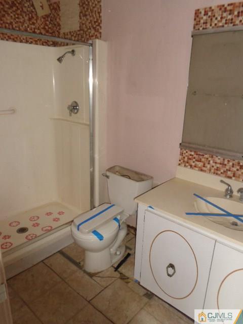 31 A Haddon Road Monroe Township, NJ 08831 - Photo 10 of 13 a bathroom with a sink and toilet