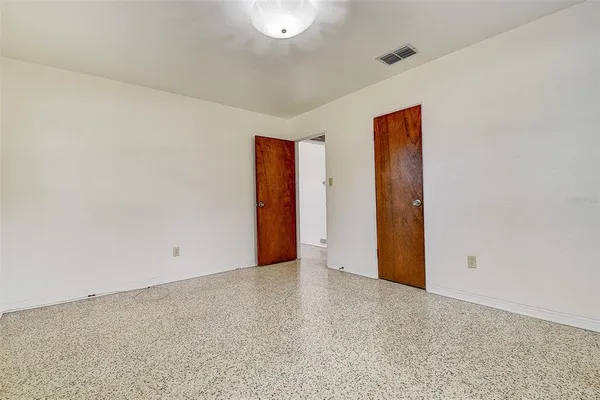 a view of an empty room and window
