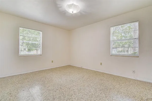 a kitchen with appliances a sink and a cabinets