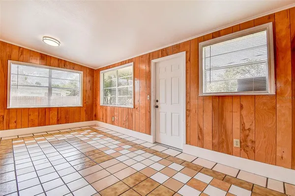 an empty room with windows