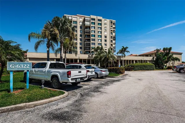 a view of a street with cars