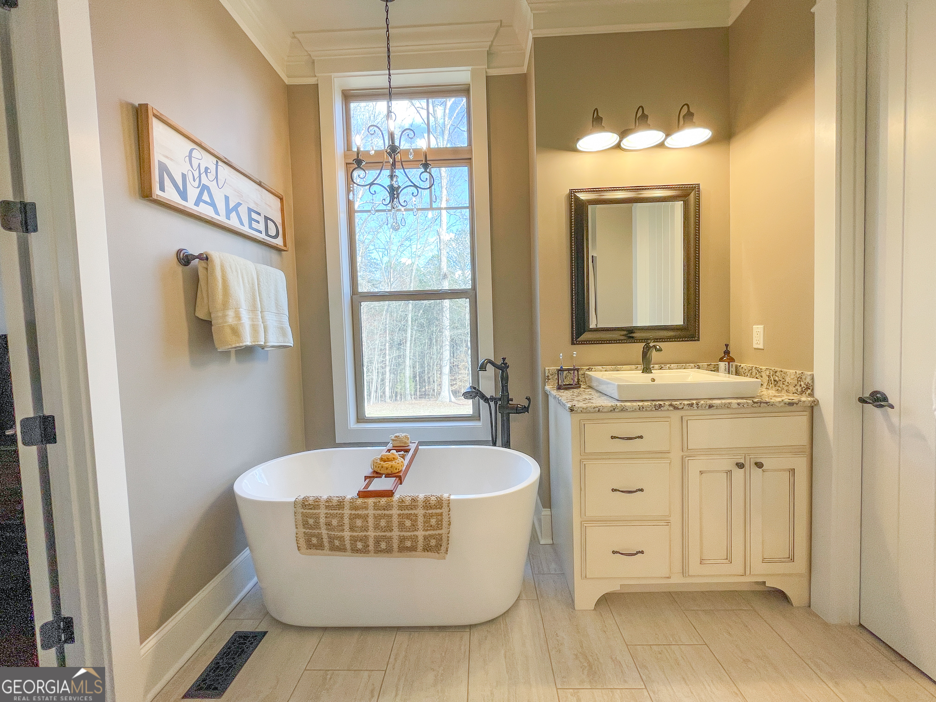 39 Acres On E Teloga Road Summerville, GA 30747 - Photo 19 of 50 a spacious bathroom with a tub sink and mirror