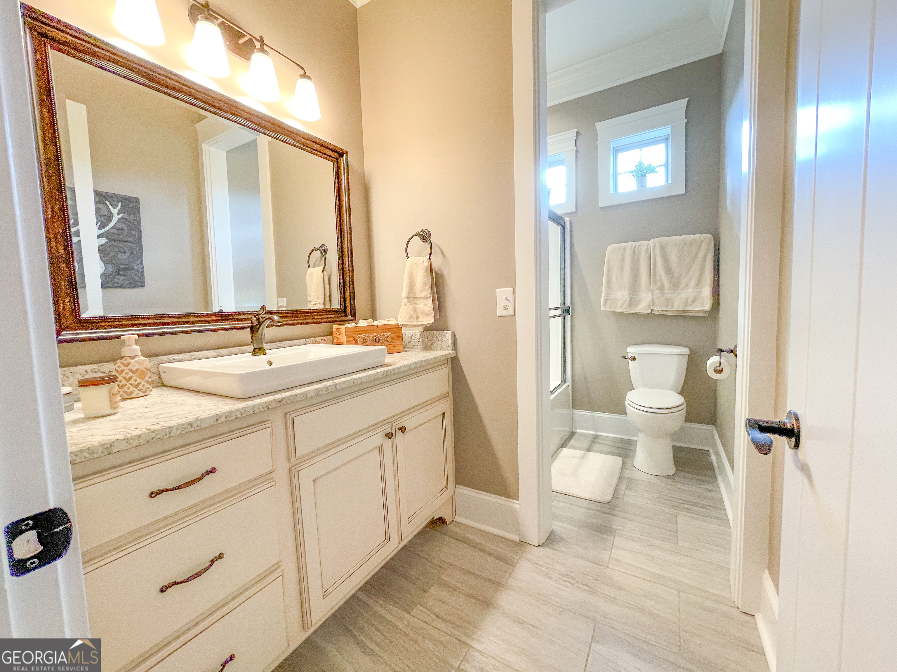 39 Acres On E Teloga Road Summerville, GA 30747 - Photo 24 of 50 a bathroom with a double vanity sink and a mirror