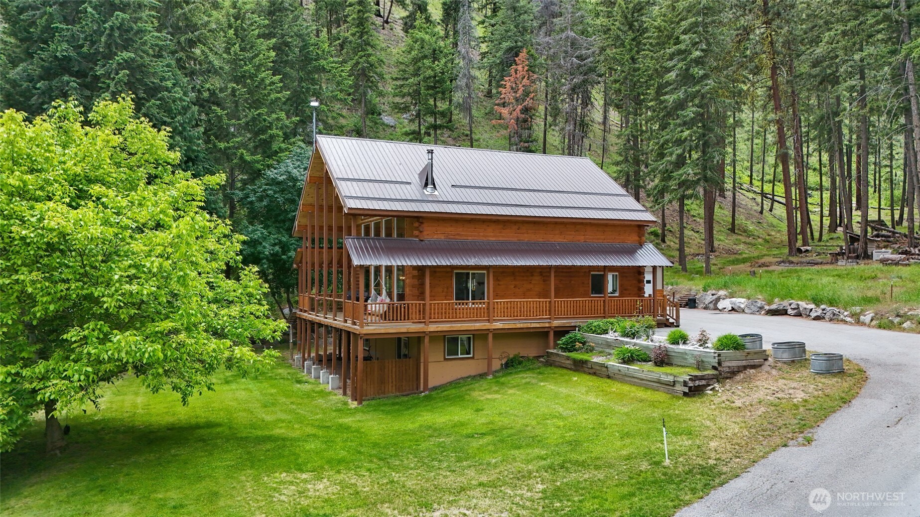 11125 Entiat River Road Entiat, WA 98822 - Photo 2 of 40 a view of a house with a yard balcony and sitting area