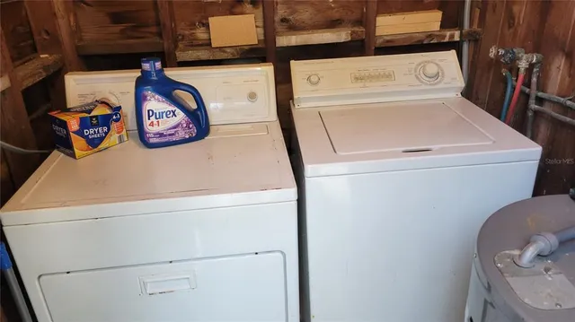 a utility room with dryer and washer