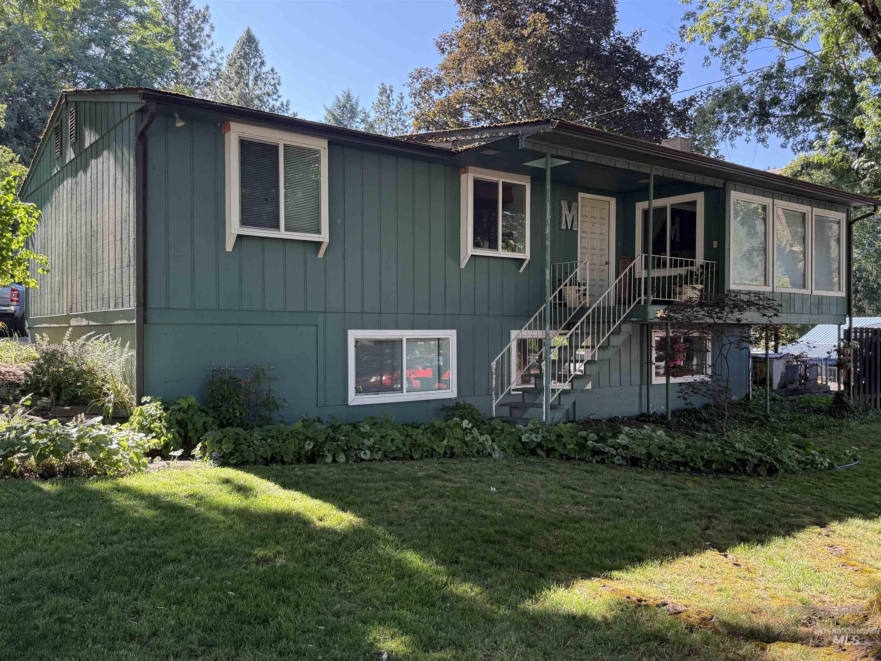 403 138th Street Orofino, ID 83544 - Photo 2 of 32 View of front of property with a front yard and stairway