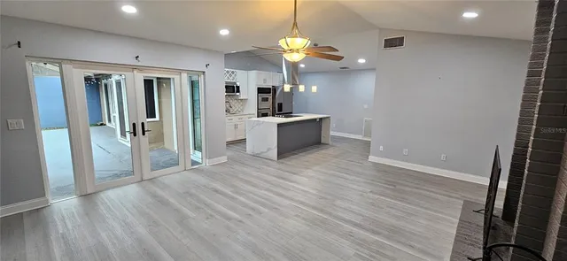 a view of a kitchen from the hallway