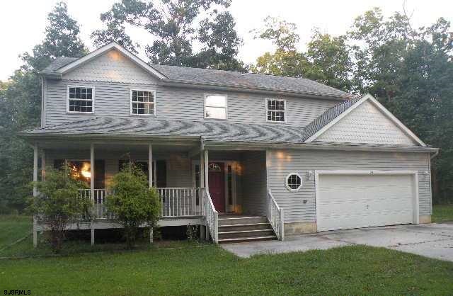34 Cannon Range Road Milmay, NJ 08340 - Photo 1 of 1 a front view of a house with a garden