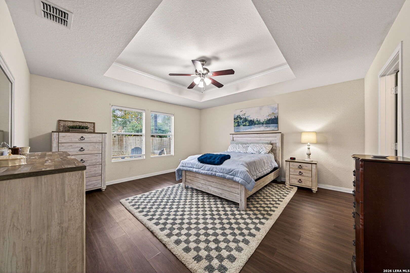 7942 Ruidoso Chase Selma, TX 78154 - Photo 15 of 26 a bedroom with furniture window and wooden floor