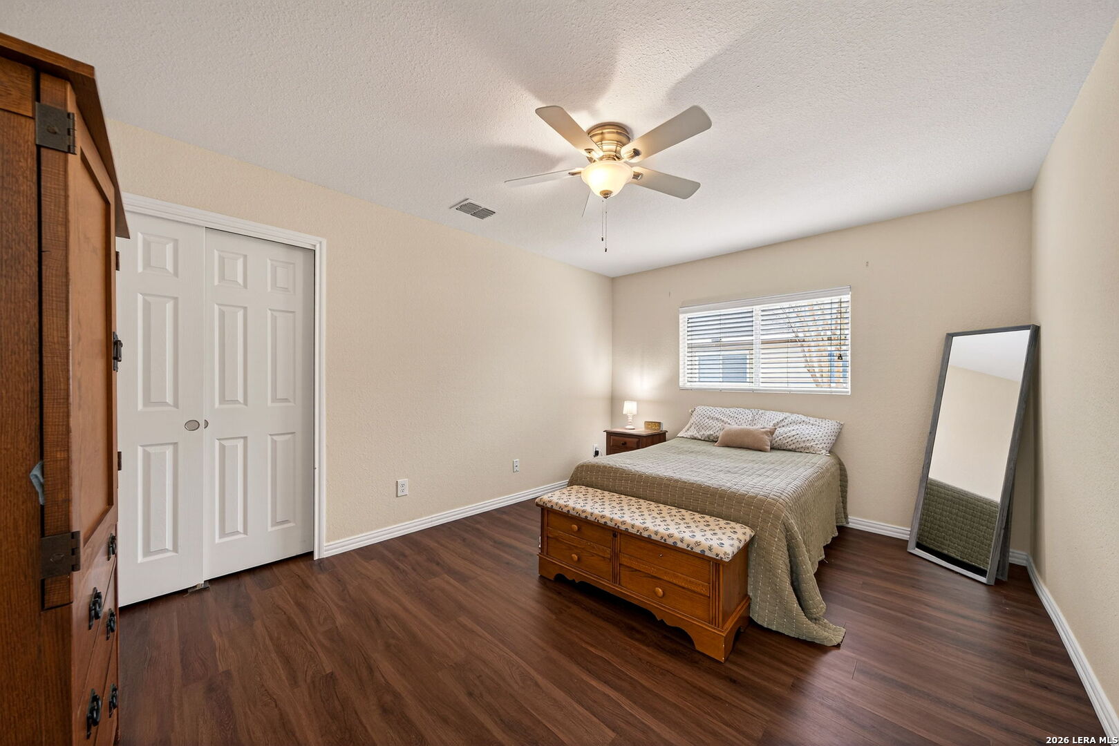 7942 Ruidoso Chase Selma, TX 78154 - Photo 18 of 26 a bedroom with a bed and a window