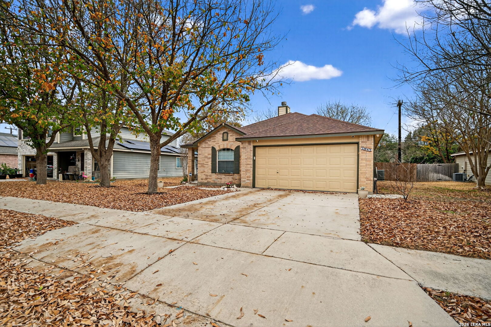 7942 Ruidoso Chase Selma, TX 78154 - Photo 25 of 26 a front view of a house with a garden