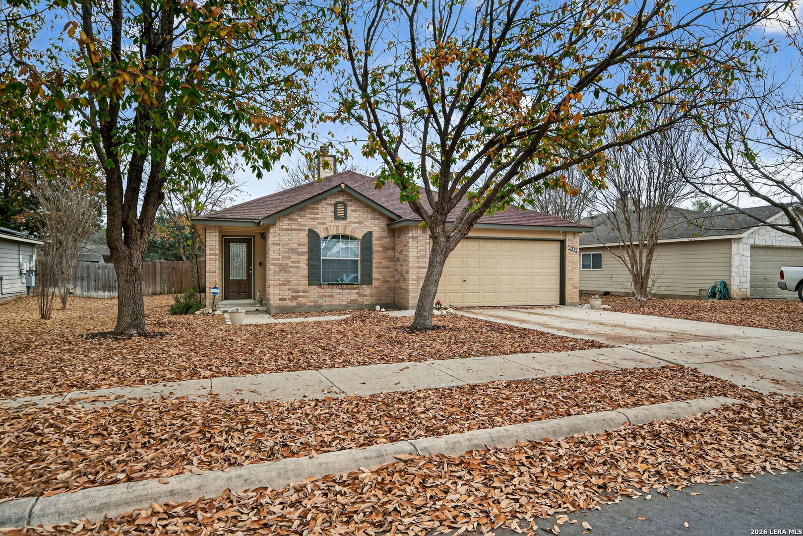 7942 Ruidoso Chase Selma, TX 78154 - Photo 26 of 26 a front view of a house with a garden