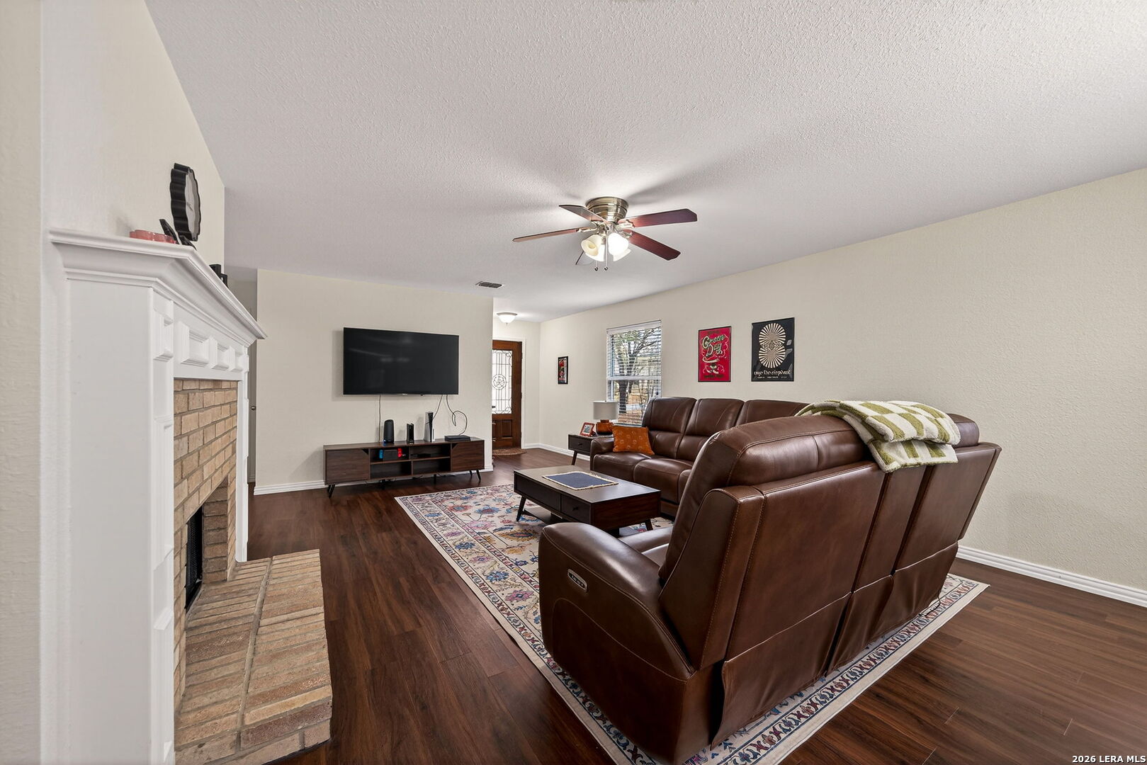 7942 Ruidoso Chase Selma, TX 78154 - Photo 6 of 26 a living room with furniture and a flat screen tv