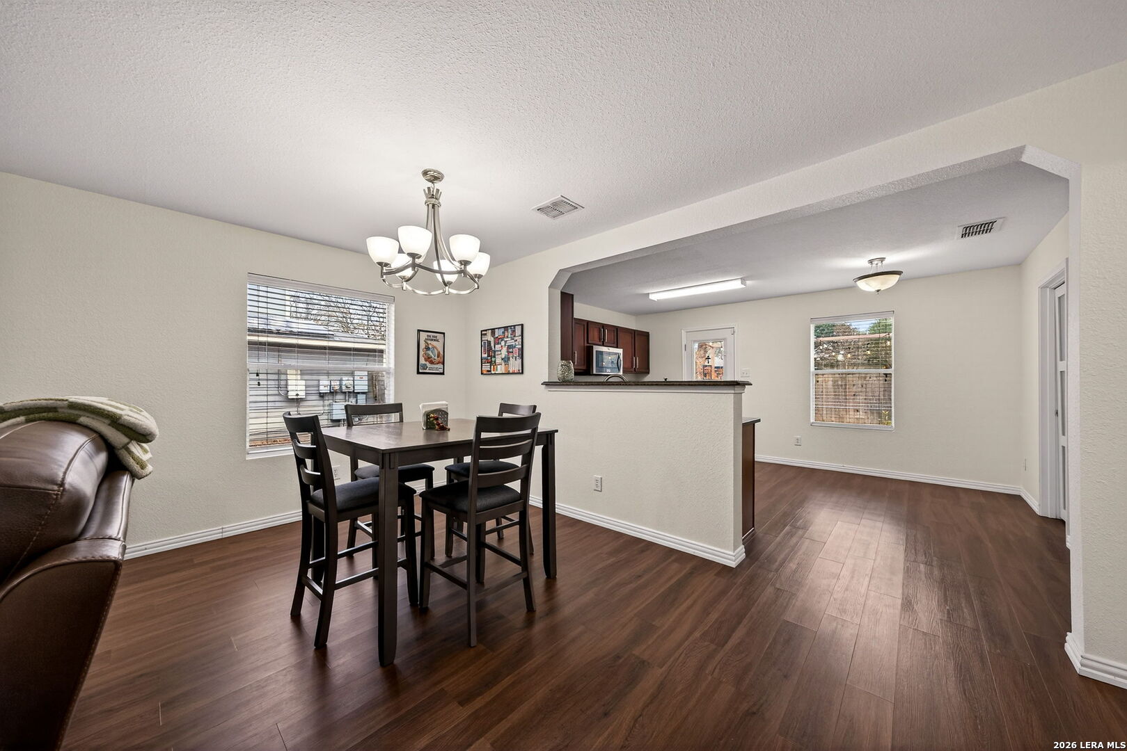 7942 Ruidoso Chase Selma, TX 78154 - Photo 9 of 26 a view of a dining room with furniture and wooden floor