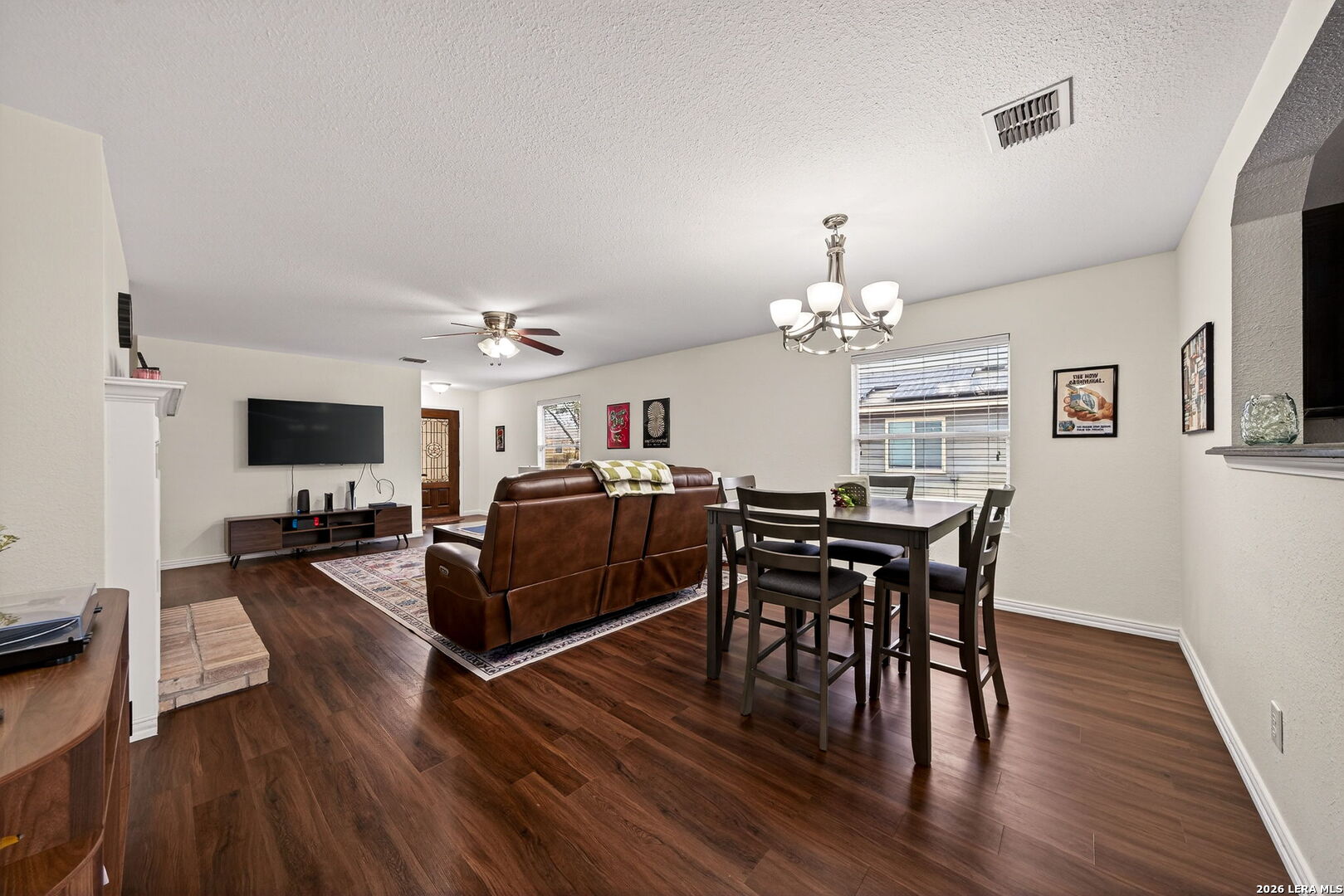 7942 Ruidoso Chase Selma, TX 78154 - Photo 10 of 26 a view of a dining room with furniture and wooden floor