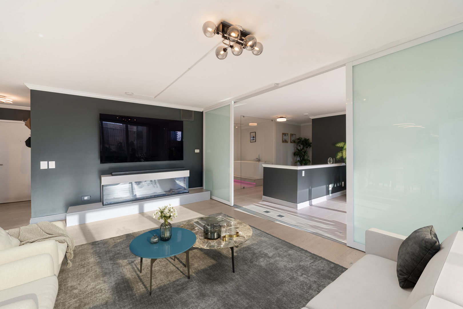 1516 North State Parkway, Unit 5D Chicago, IL 60610 - Photo 11 of 34 a living room with furniture and a flat screen tv