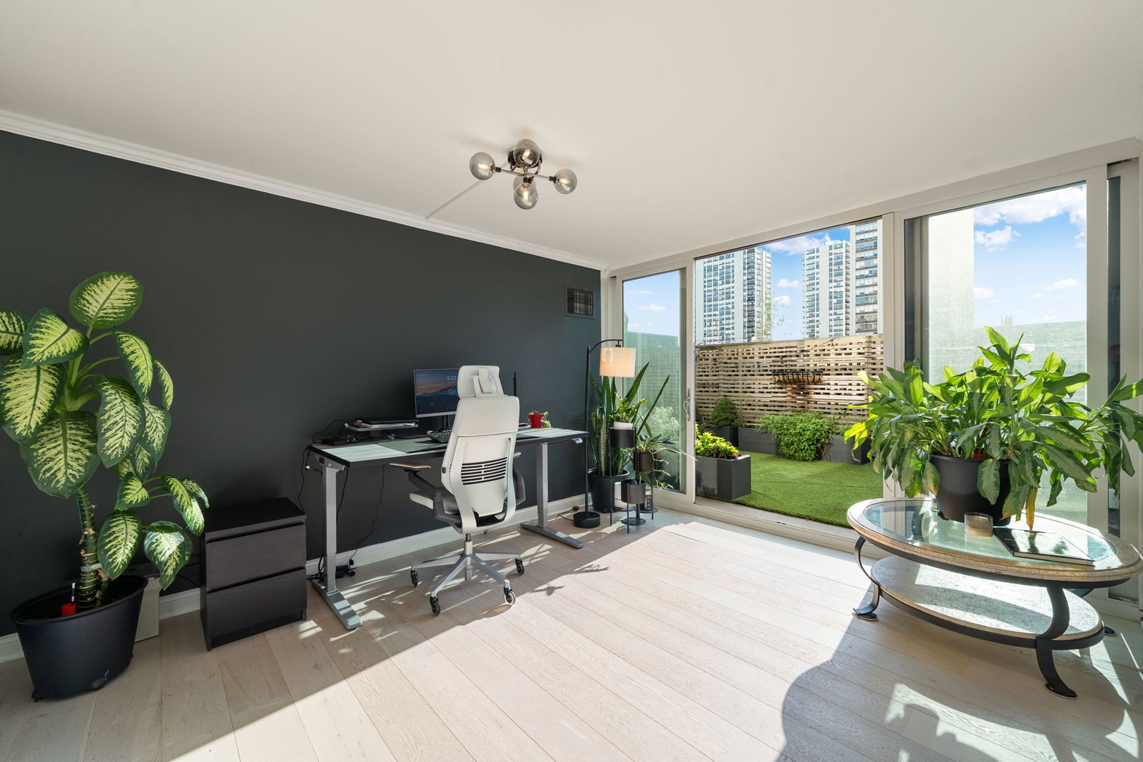 1516 North State Parkway, Unit 5D Chicago, IL 60610 - Photo 16 of 34 a living room with furniture potted plant and a window