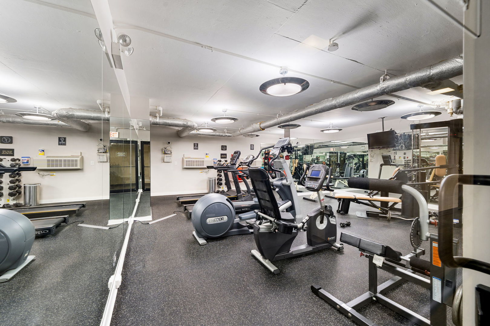 1516 North State Parkway, Unit 5D Chicago, IL 60610 - Photo 26 of 34 a view of a room with gym equipment