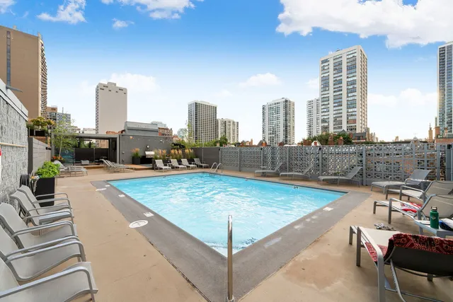 a view of outdoor space with swimming pool