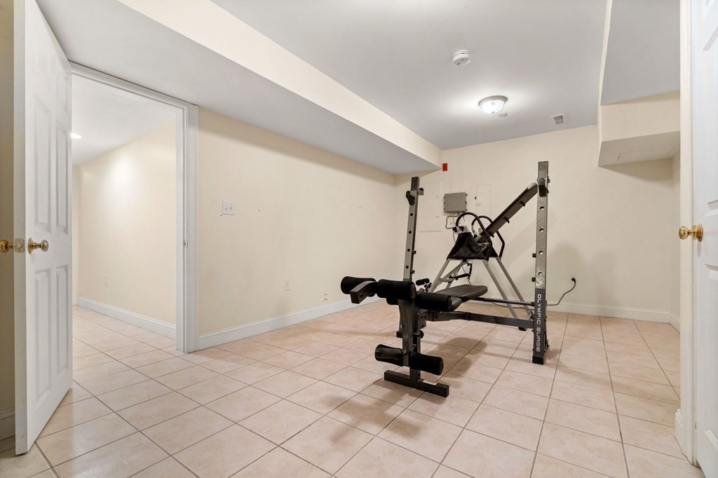2 Hannah Dodge Road, Unit A Littleton, MA 01460 - Photo 24 of 28 a view of a room with gym equipment