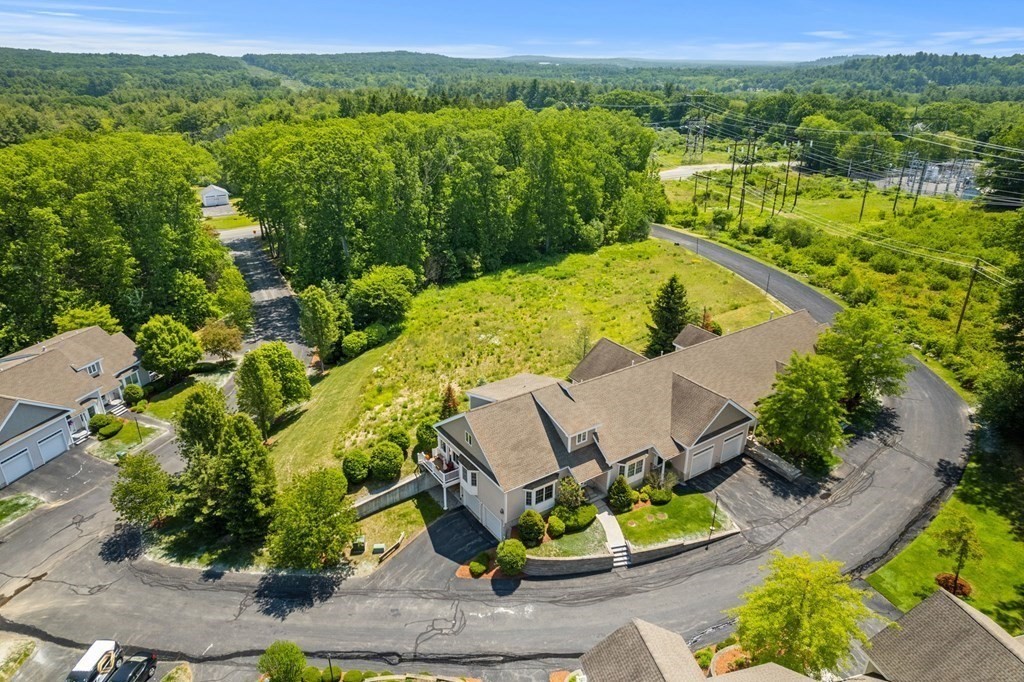 2 Hannah Dodge Road, Unit A Littleton, MA 01460 - Photo 25 of 28 an aerial view of a house with a garden