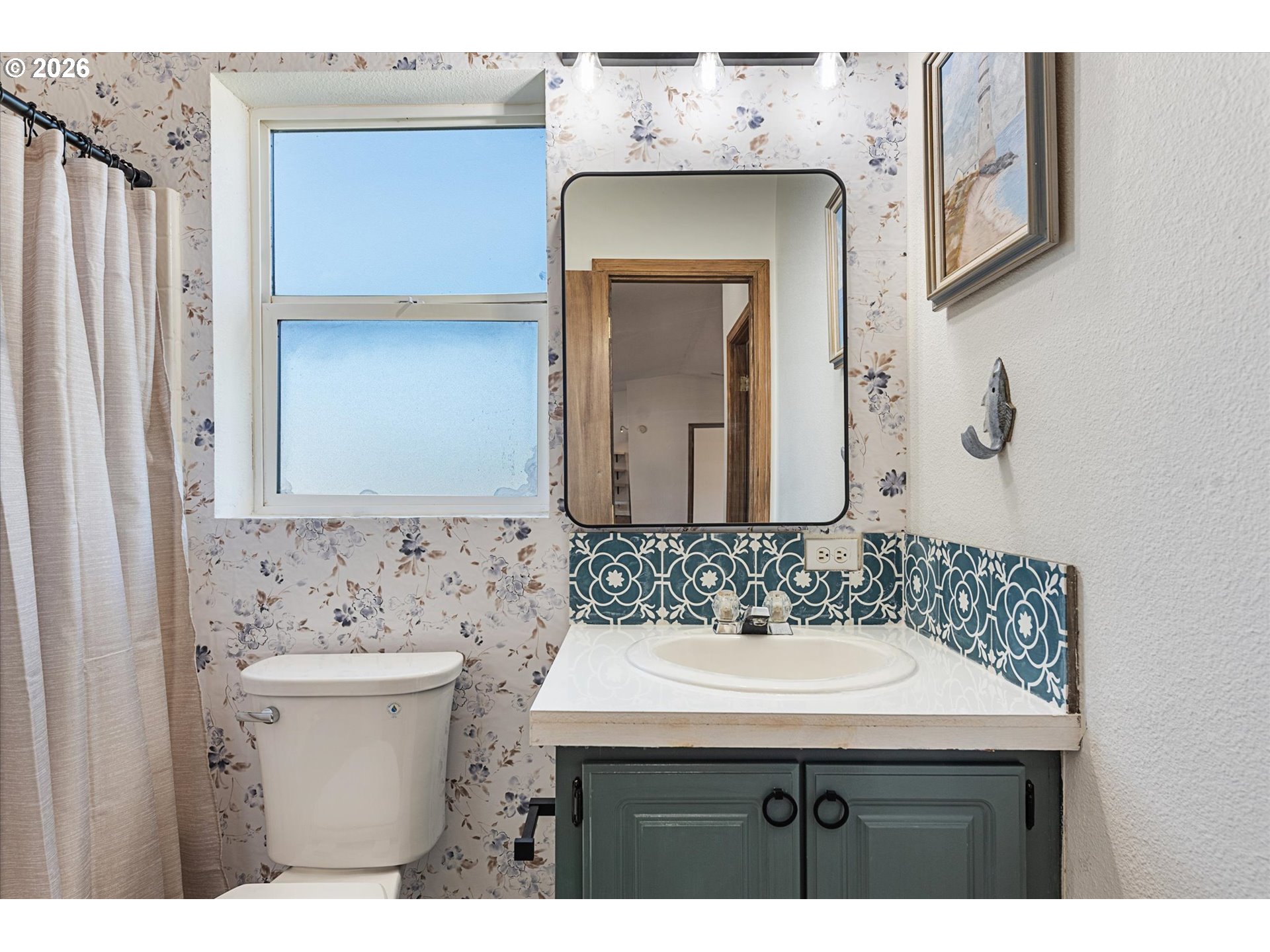 14386 Ben-Dier Road Baker City, OR 97814 - Photo 31 of 42 a bathroom with a sink and a mirror