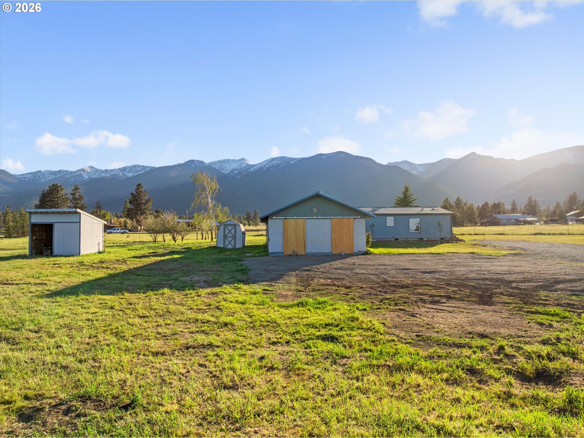 14386 Ben-Dier Road Baker City, OR 97814 - Photo 5 of 42 a view of a house with a big yard