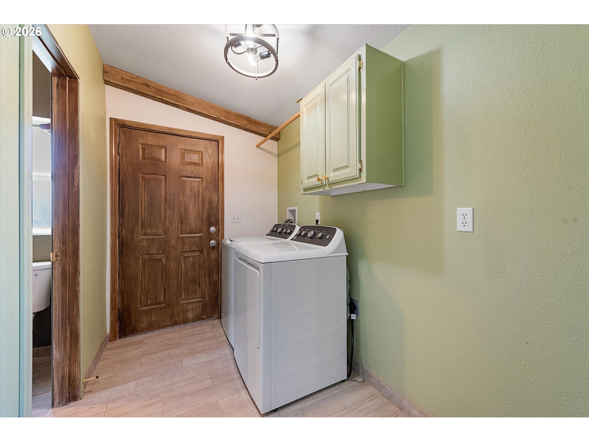 14386 Ben-Dier Road Baker City, OR 97814 - Photo 9 of 42 a utility room with a sink and a mirror