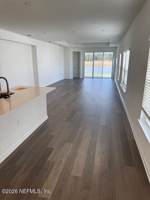 33 Chestnut Grv Road St. Augustine, FL 32092 - Photo 4 of 15 a view of an empty room with glass door and wooden floor
