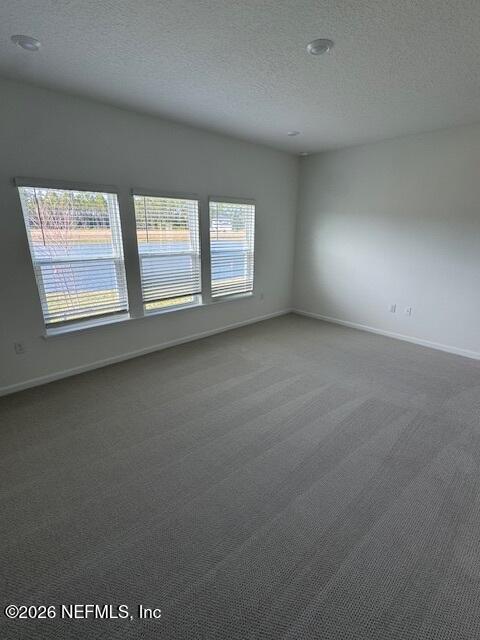 33 Chestnut Grv Road St. Augustine, FL 32092 - Photo 7 of 15 an empty room with windows