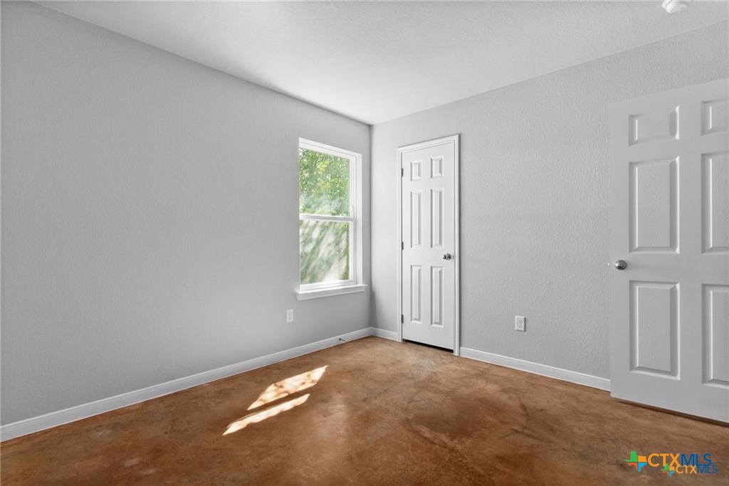 117 East Valley Road Harker Heights, TX 76548 - Photo 11 of 33 an empty room with windows
