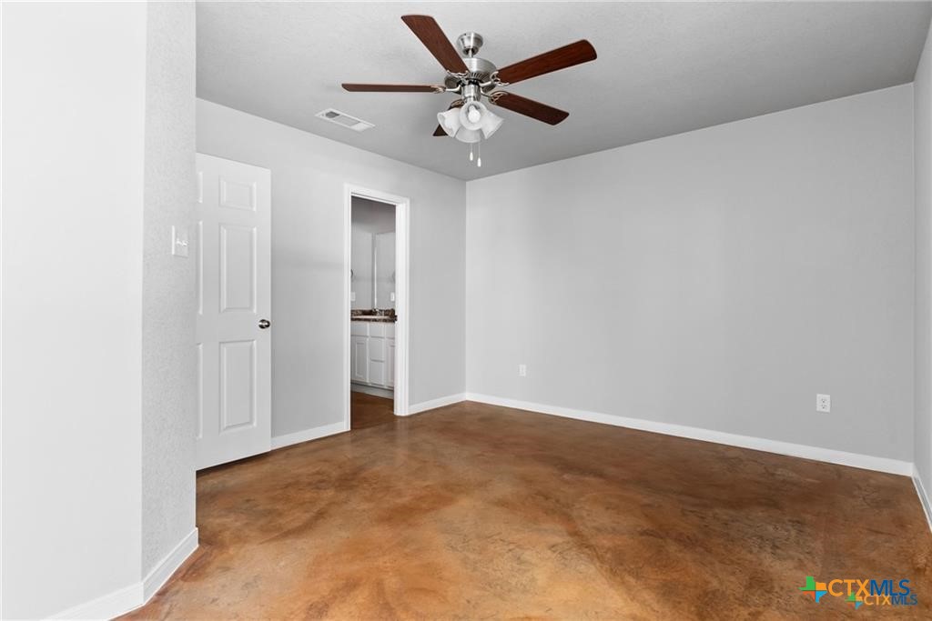 117 East Valley Road Harker Heights, TX 76548 - Photo 24 of 33 an empty room with closet and a ceiling fan
