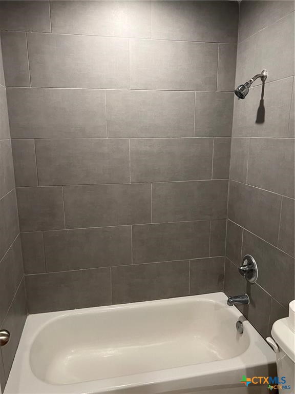 117 East Valley Road Harker Heights, TX 76548 - Photo 28 of 33 a white bath tub sitting next to a white sink