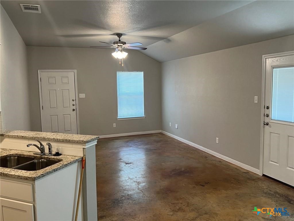 117 East Valley Road Harker Heights, TX 76548 - Photo 10 of 33 a view of a sink and a stove in a room