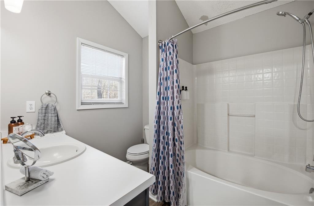 20 Miners Point Acworth, GA 30102 - Photo 11 of 21 a bathroom with a sink toilet and shower