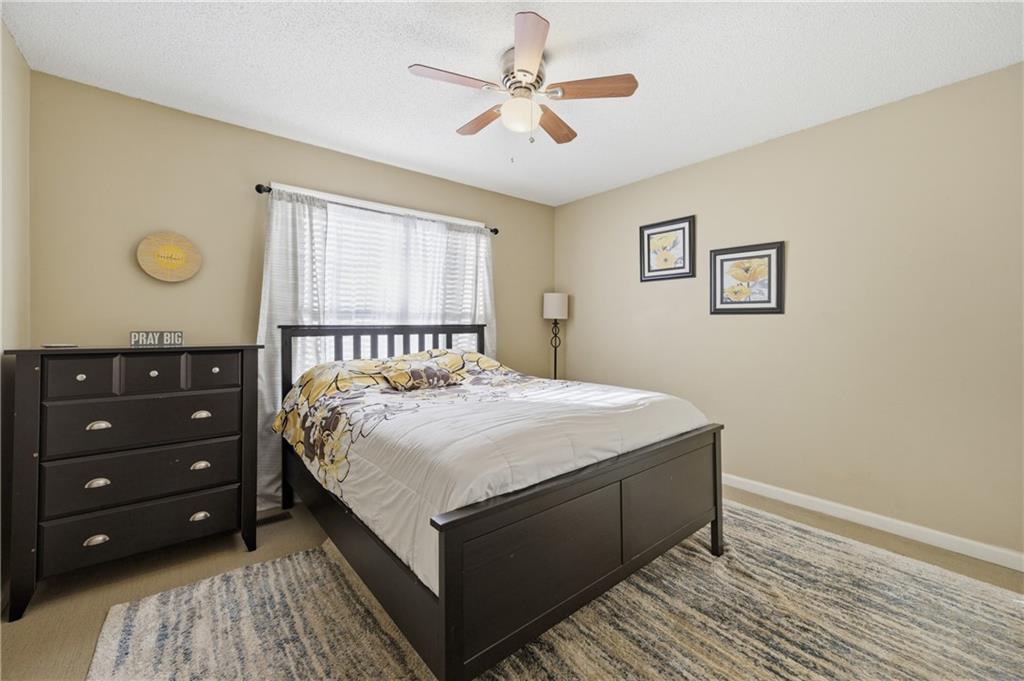 20 Miners Point Acworth, GA 30102 - Photo 12 of 21 a bedroom with a bed and a window