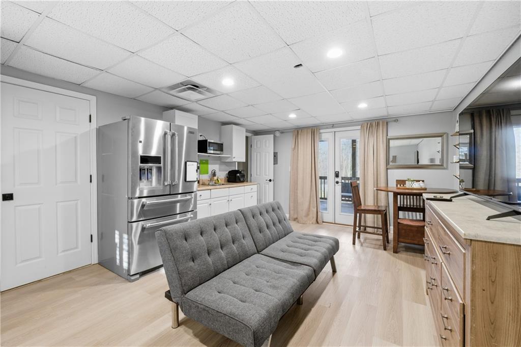 20 Miners Point Acworth, GA 30102 - Photo 17 of 21 a living room with stainless steel appliances furniture and a kitchen view